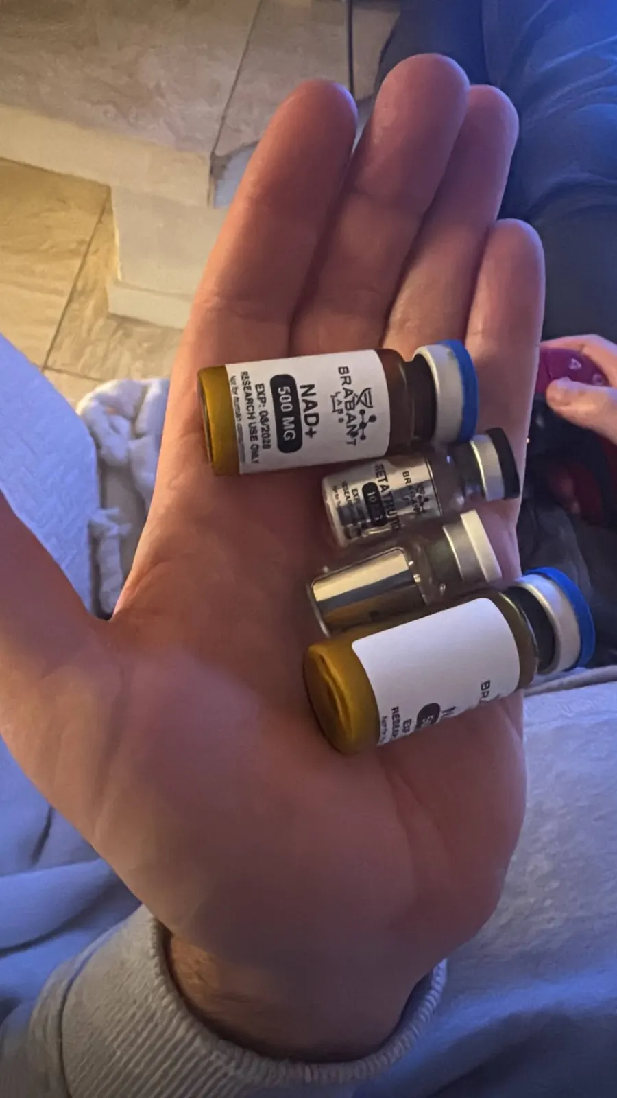 NAD+ 500 mg and retatrutide in hand